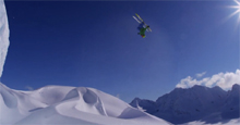 Zach Giffin in Alaska making a jump through the air.