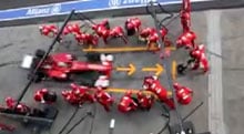 A team of 21 work together on a Ferrari F1 in the pit stop. Amazing.