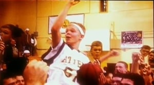 J Mac being held on shoulders by his high school fans
