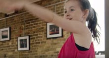 A girl dancing when asked what she would do if she could do anything but had to start today